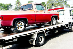 Red Car Towing